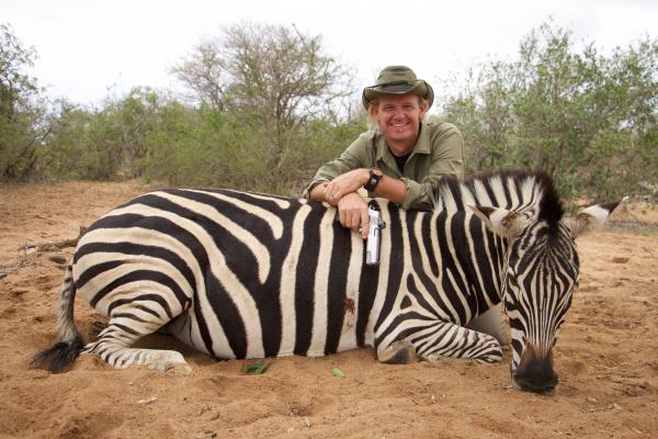 Razor Dobbs with Zebra he killed with 10mm Handgun Razor Dobbs with Zebra he killed with 10mm Handgun